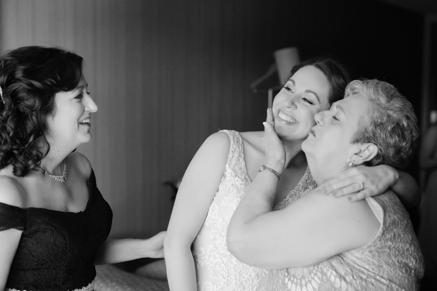 Bride's portraits at Courtyard Marriott before Pen Ryn wedding.